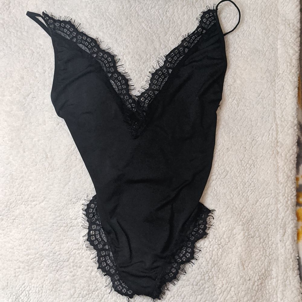 NWOT medium black lace trimmed bodysuit